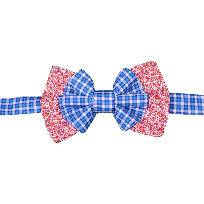 Red bowtie with white flowers and white with blue plaid