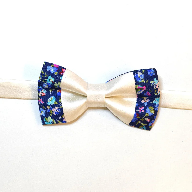 White bowtie with blue multi color flower border